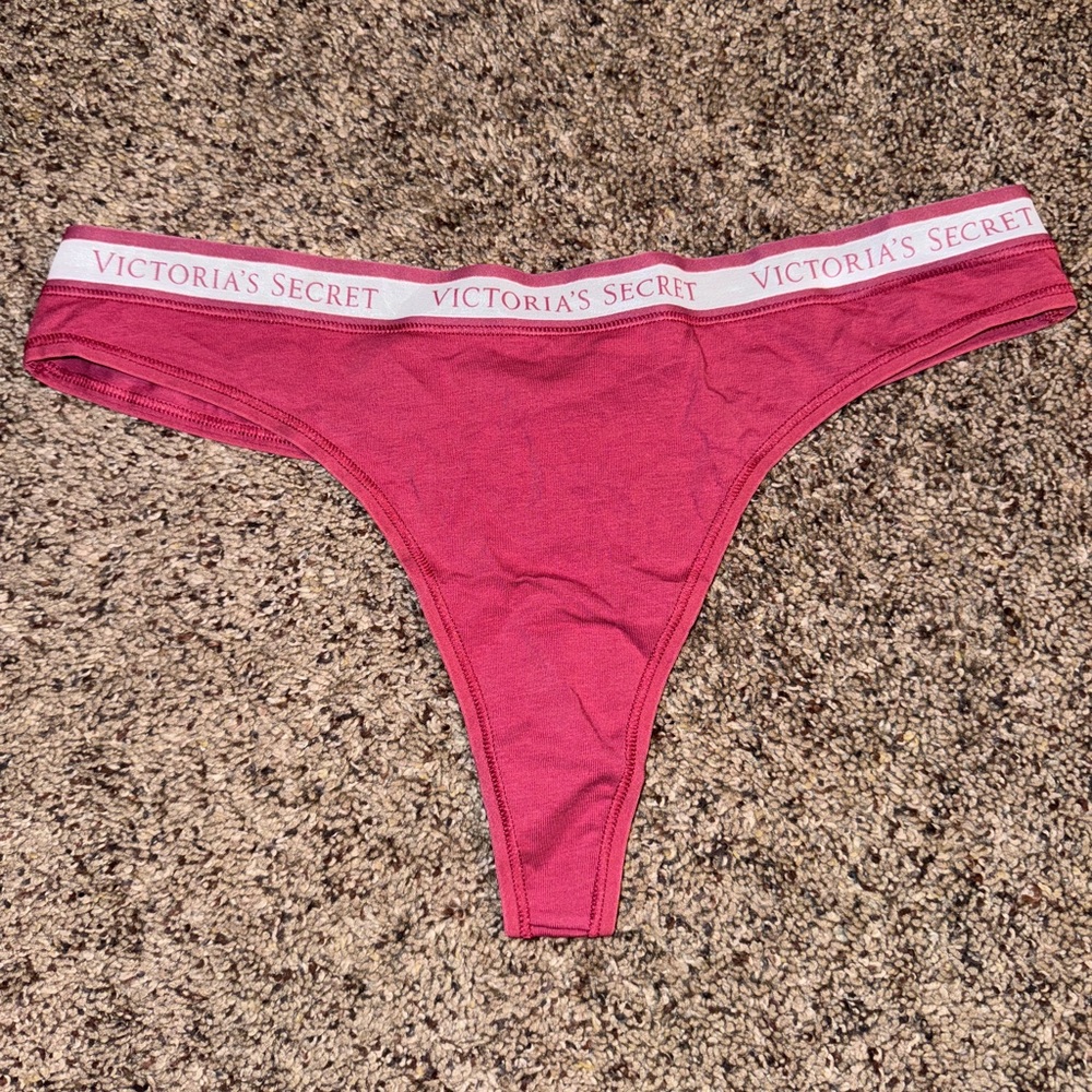 Red Victoria’s Secret string thong. Size large